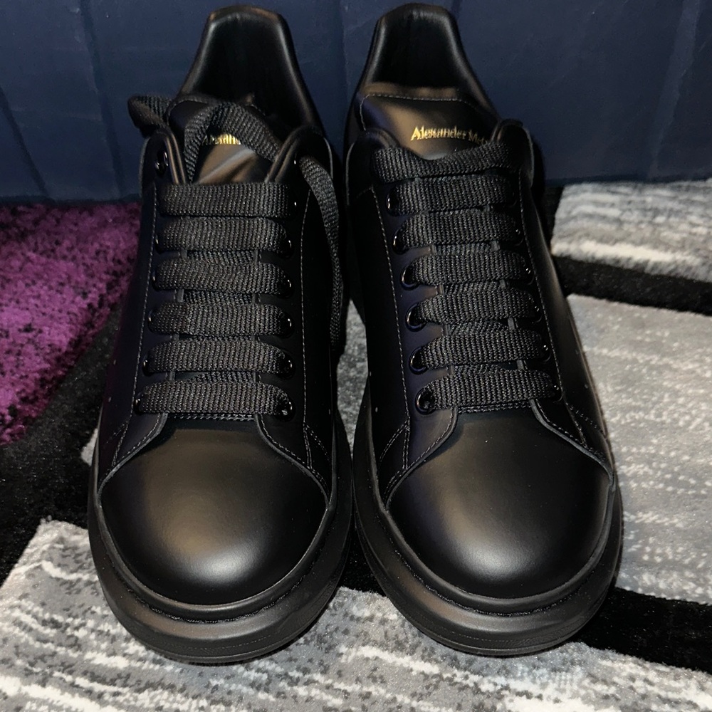 Alexander McQueen Black Leather Low-Profile Sneakers with Subtle Gold Logo